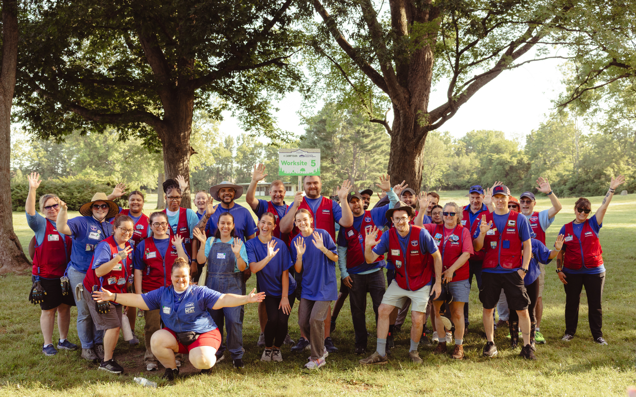Volunteers standing and posing for the camera.